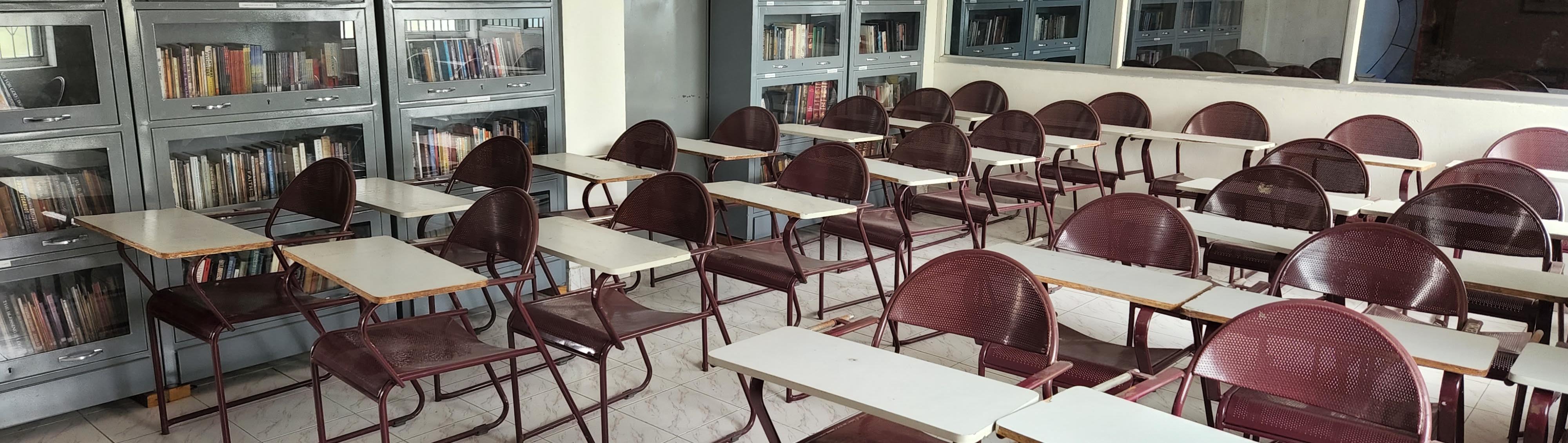 Photo of empty classroom by Nico Smit on Unsplash